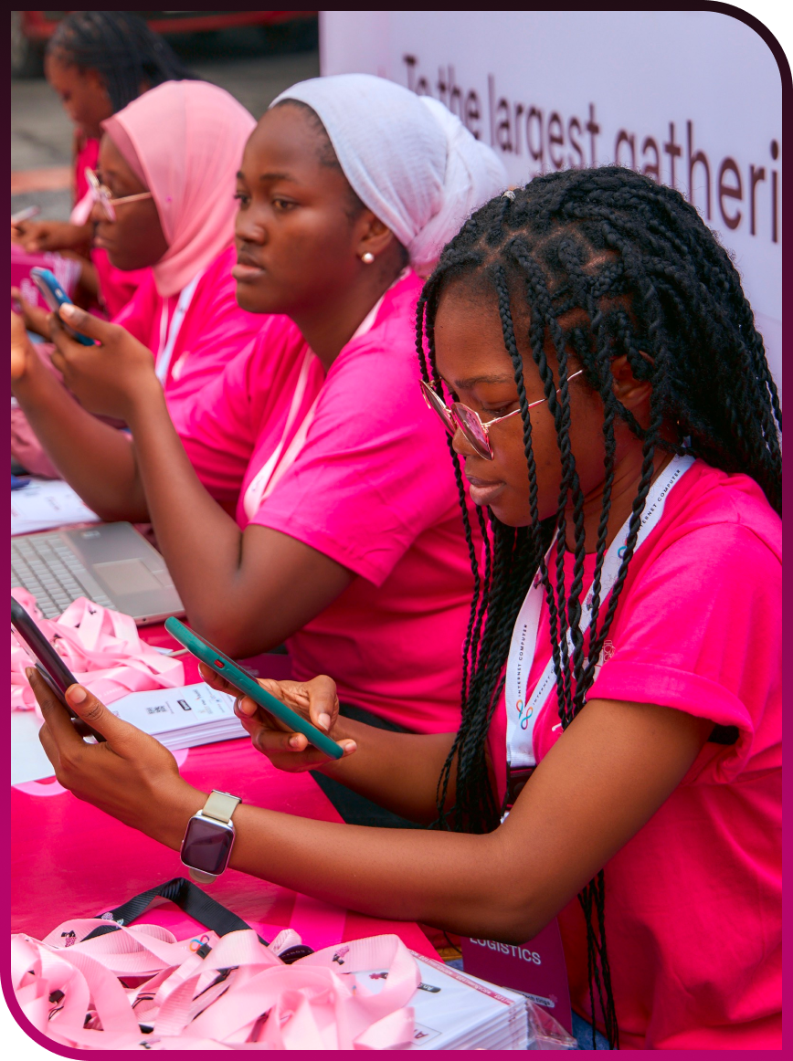Volunteers at the She Code Africa Summit registration desk